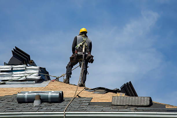 Professional Roof Replacement technician working in Grover, WY